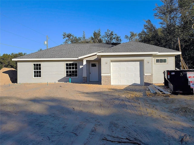 view of front of home with a garage