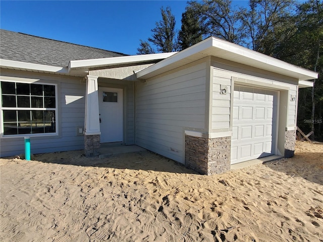 entrance to property with a garage