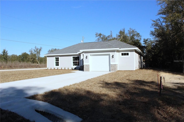 garage with a lawn