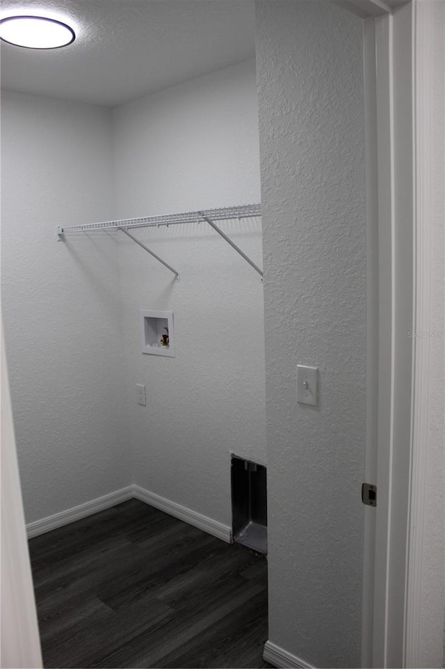 clothes washing area with washer hookup and dark hardwood / wood-style floors