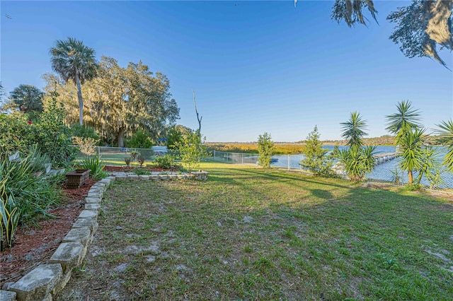 view of yard with a water view