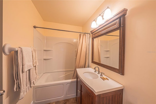 bathroom featuring vanity and shower / bathtub combination with curtain