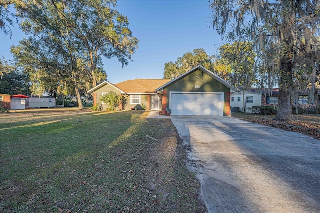 ranch-style home with a front yard and a garage