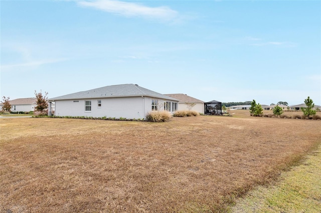 view of home's exterior featuring a lawn