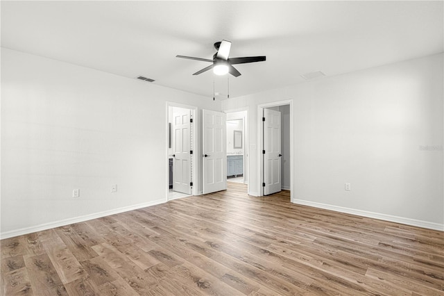 unfurnished bedroom featuring ceiling fan and light hardwood / wood-style flooring