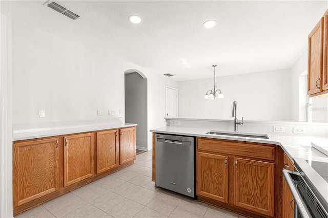 kitchen with dishwasher, sink, hanging light fixtures, a notable chandelier, and light tile patterned flooring