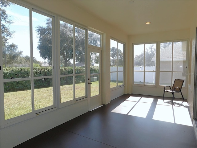 unfurnished sunroom with plenty of natural light