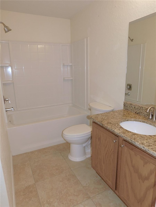 full bathroom with shower / bathing tub combination, tile patterned flooring, vanity, and toilet