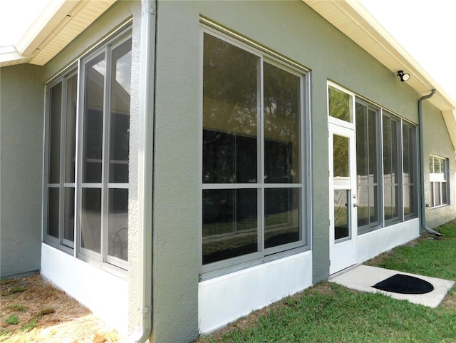 view of home's exterior with stucco siding