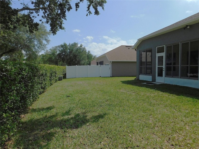 view of yard featuring fence