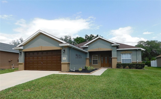 single story home with an attached garage, stucco siding, a front lawn, and driveway