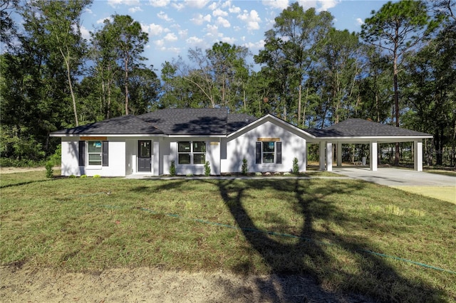 single story home featuring a front yard and a carport