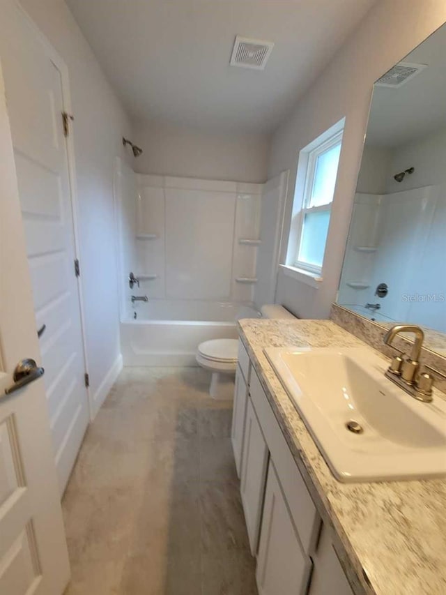 full bathroom featuring vanity, toilet, and shower / washtub combination