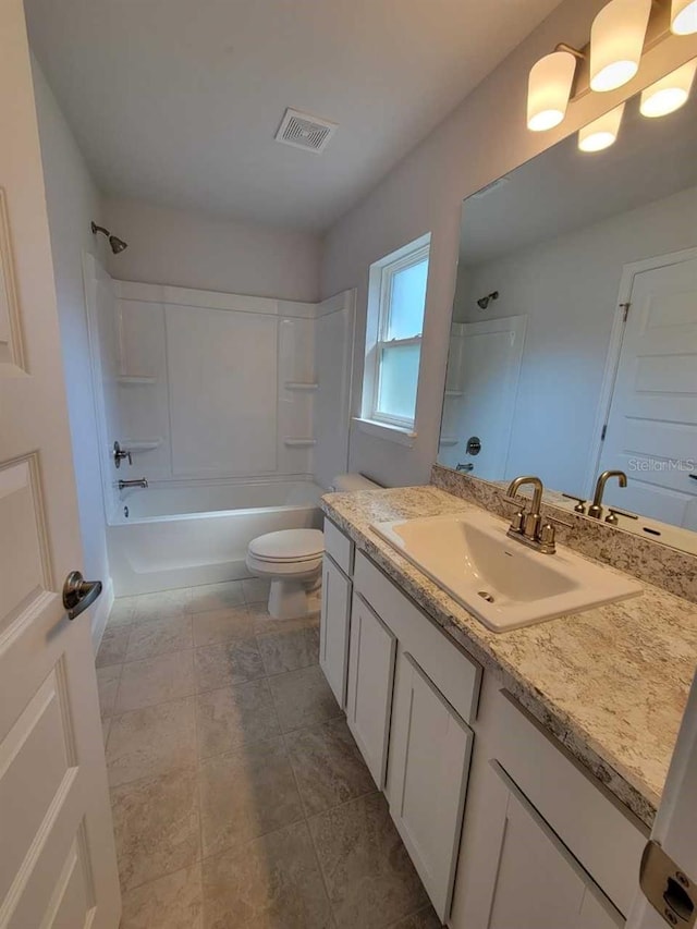 full bathroom with shower / bathing tub combination, vanity, and toilet