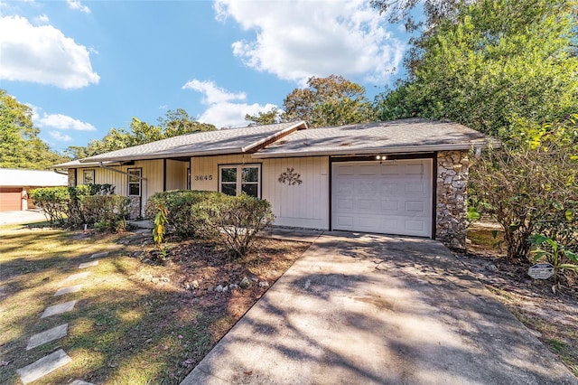 ranch-style home with a garage