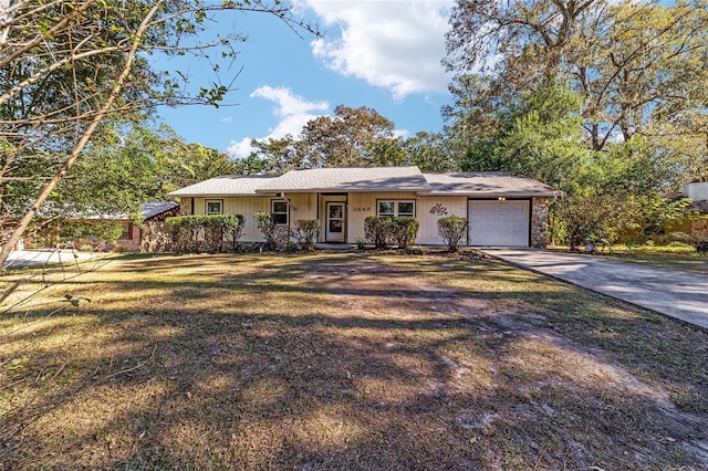 ranch-style home with a garage