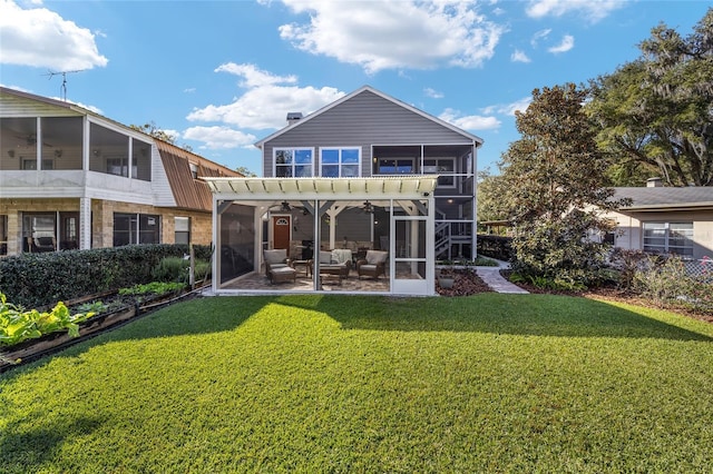 back of house featuring a lawn, an outdoor living space, a pergola, and a sunroom