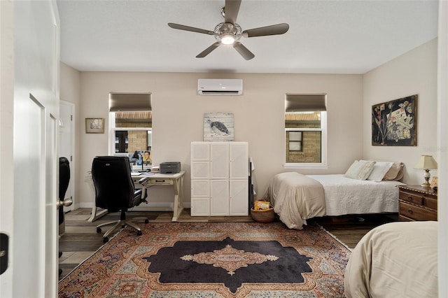 bedroom featuring an AC wall unit, ceiling fan, and wood-type flooring