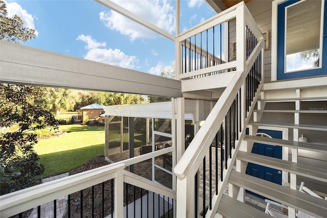 wooden deck with a yard