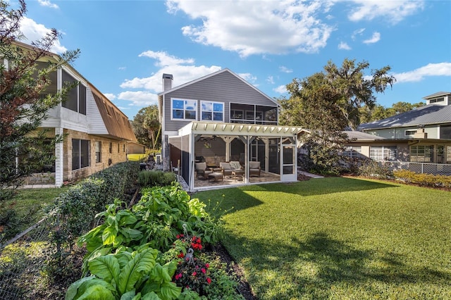 back of house with a pergola, a yard, and a patio