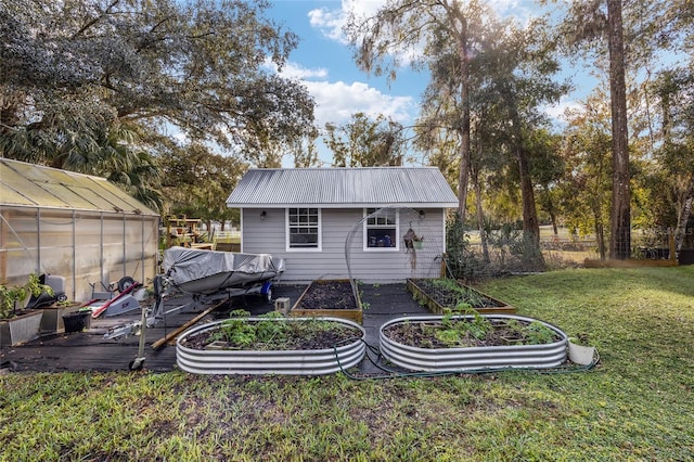 view of outdoor structure with a lawn