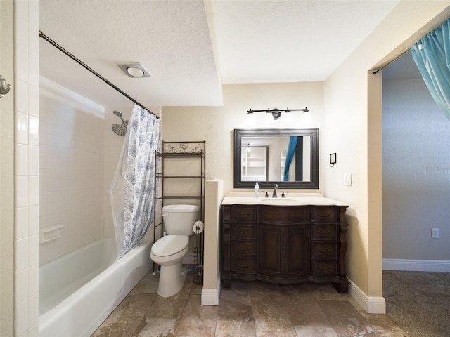 full bathroom featuring shower / tub combo with curtain, vanity, a textured ceiling, and toilet