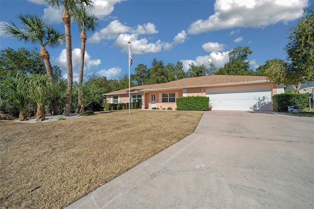 ranch-style home featuring a front yard and a garage