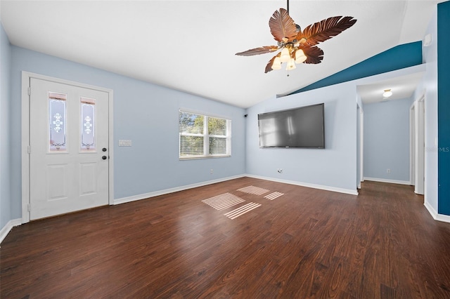 foyer entrance with lofted ceiling, ceiling fan, and dark hardwood / wood-style floors