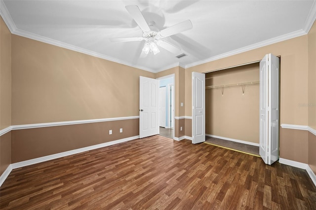 unfurnished bedroom with ceiling fan, dark hardwood / wood-style flooring, and crown molding