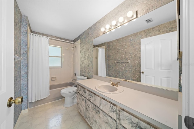 full bathroom featuring toilet, vanity, and shower / tub combo with curtain