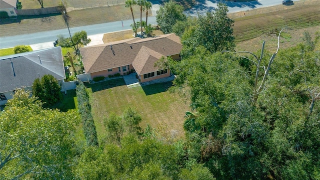 birds eye view of property with a rural view