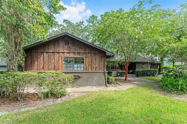 view of property exterior featuring a yard