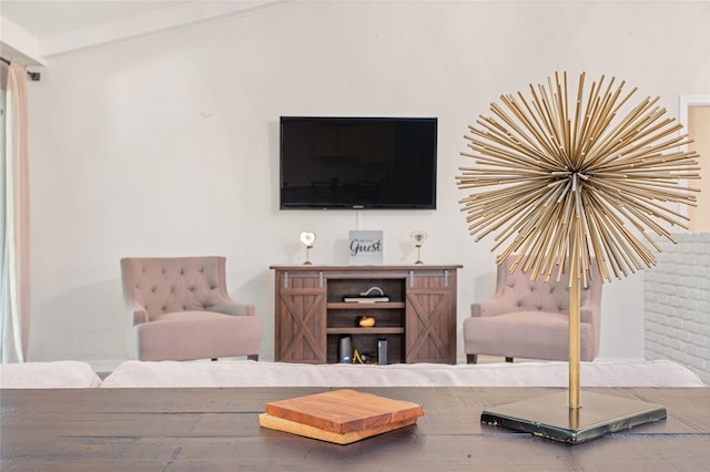 living room featuring lofted ceiling