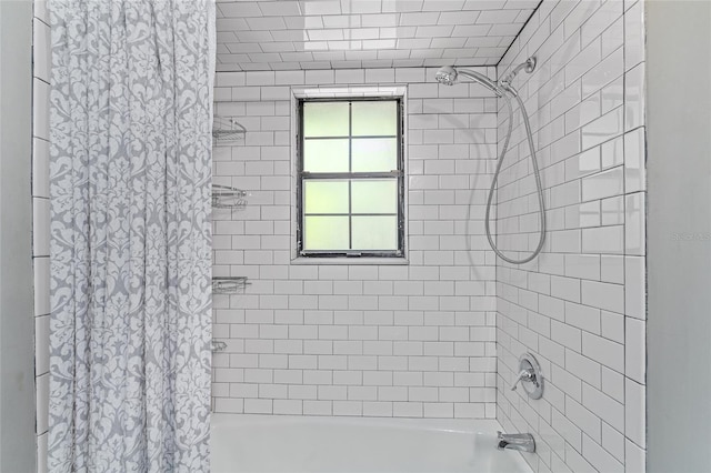 bathroom with shower / bath combo