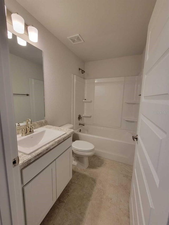 full bathroom featuring vanity, shower / bath combination, and toilet