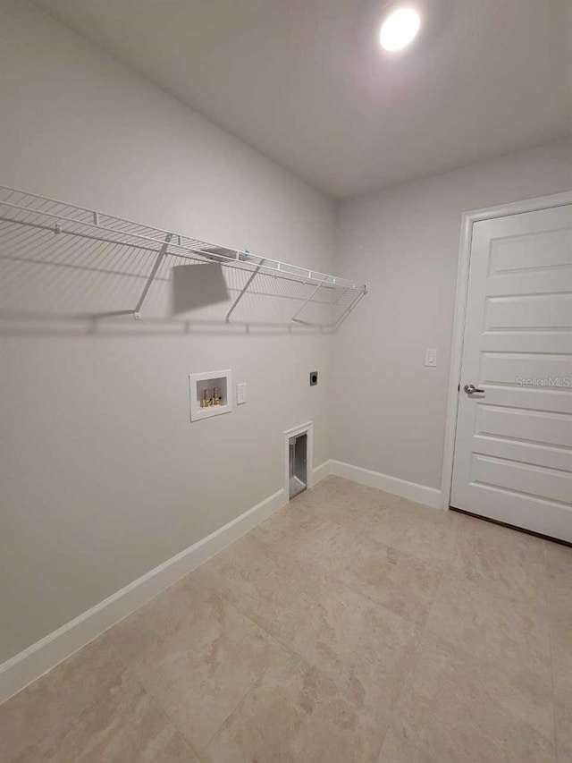 laundry room with washer hookup and electric dryer hookup