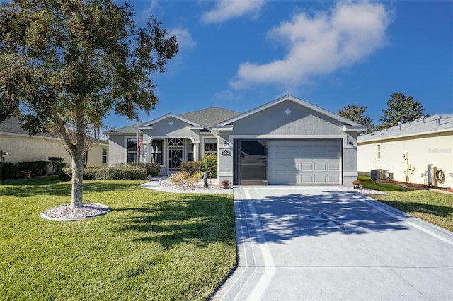 ranch-style house featuring a garage, a front lawn, and cooling unit