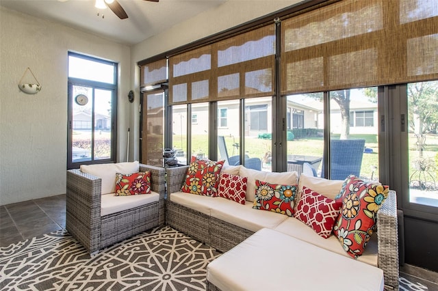 sunroom / solarium with ceiling fan