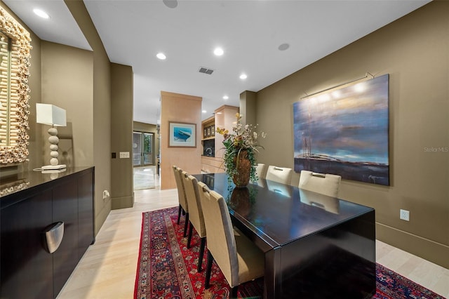 dining area with light wood-type flooring