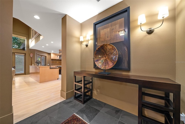 corridor with dark hardwood / wood-style floors