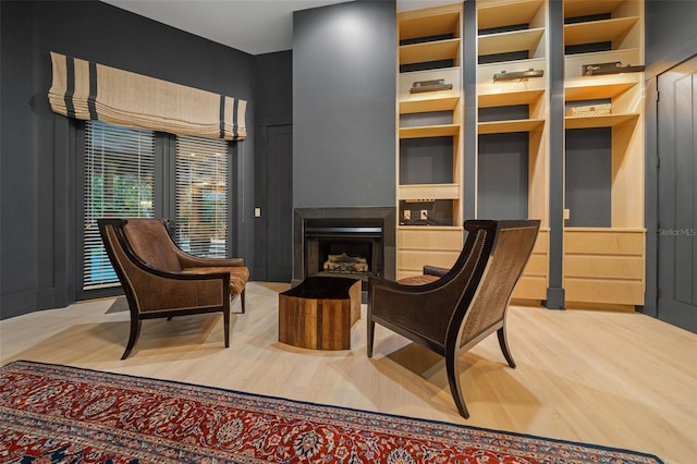 sitting room with light hardwood / wood-style floors