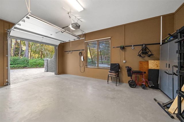 garage featuring a garage door opener