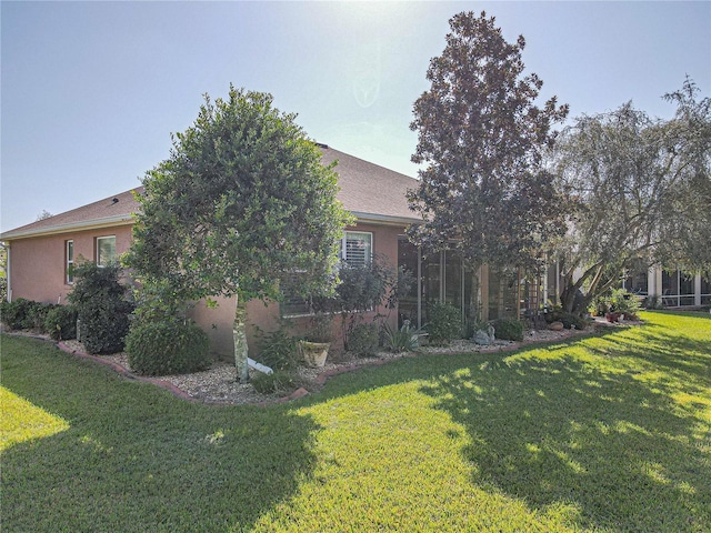 exterior space with a front lawn