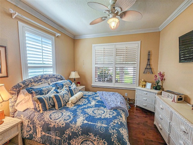 bedroom featuring ornamental molding, a textured ceiling, ceiling fan, and dark wood-type flooring