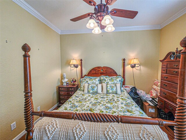 bedroom with ceiling fan and ornamental molding