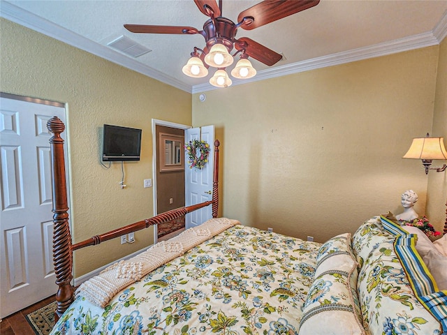 bedroom with ceiling fan, wood-type flooring, and ornamental molding