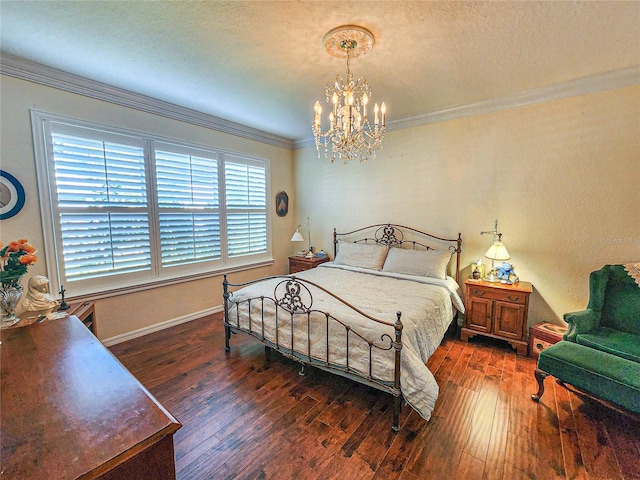 bedroom featuring a textured ceiling, crown molding, dark hardwood / wood-style floors, and an inviting chandelier