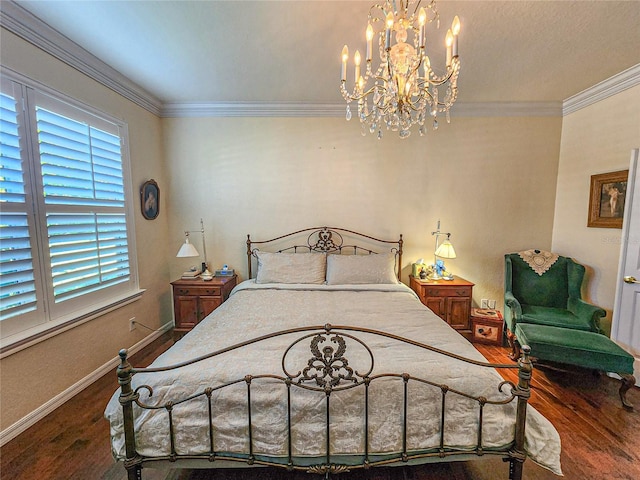 bedroom with crown molding, dark hardwood / wood-style flooring, and an inviting chandelier