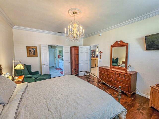 bedroom featuring dark hardwood / wood-style floors, ornamental molding, and a notable chandelier