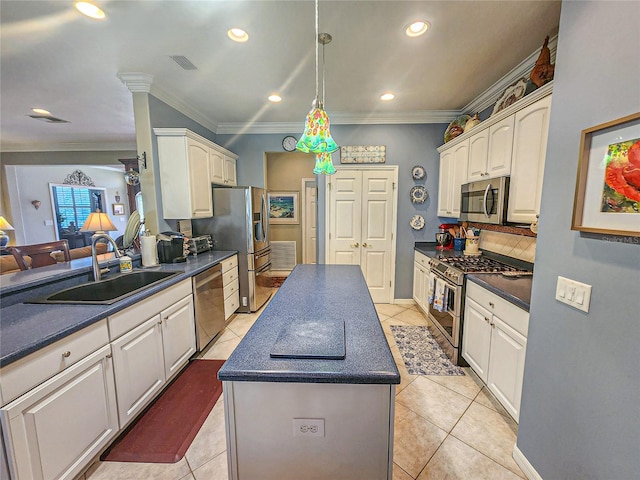 kitchen featuring stainless steel appliances, crown molding, sink, hanging light fixtures, and light tile patterned flooring